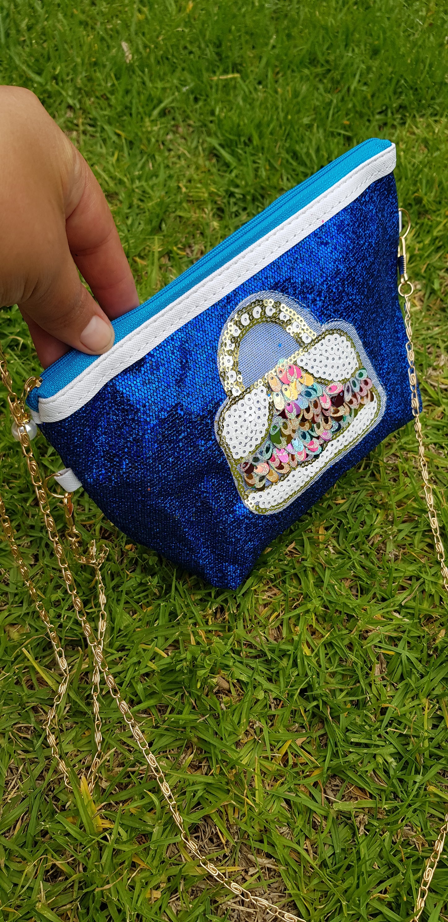 Bolsa mariconera con lentejuela azul rey